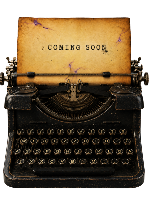 Schreibmaschine mit Papierbogen auf dem Coming soon geschrieben steht